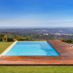 Outdoor custom pool with view and decking